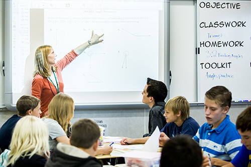 A teacher instructing students