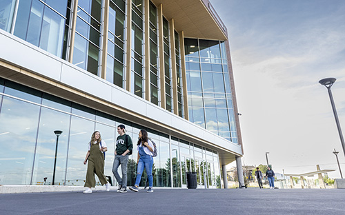 Students walking by the Keller building.