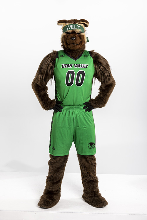 Willy the Wolverine in a green basketball uniform