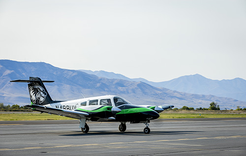 UVU aviation branded airplane on tarmac.