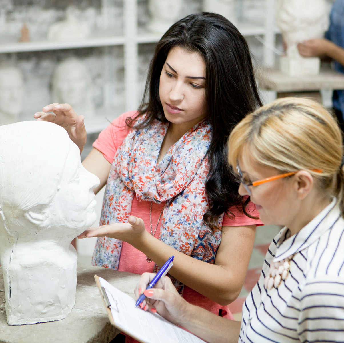 student working on a sculpture