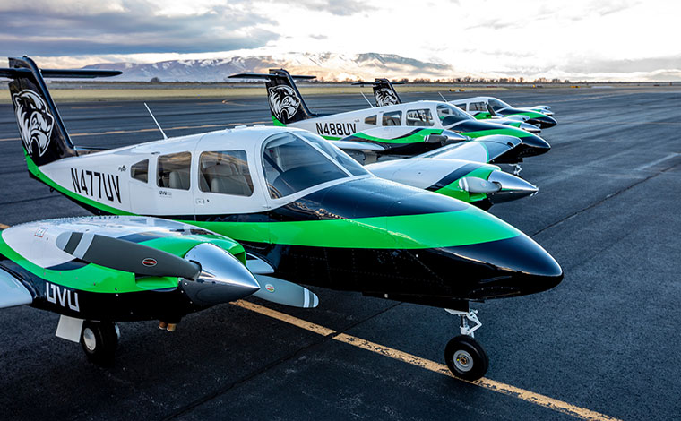 Image of UVU branded planes on a runway