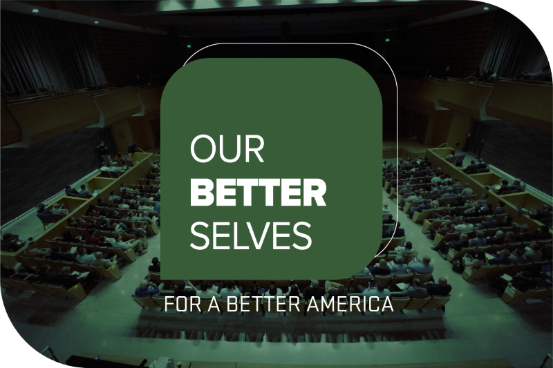 The Our Better Selves logo with the slogan "Our Better Selves for a Better America" displayed above a conference hall filled with audience members