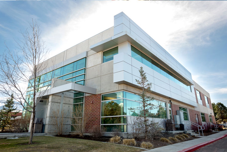 Front of the UVU Facilities Complex building, Parking Services inside