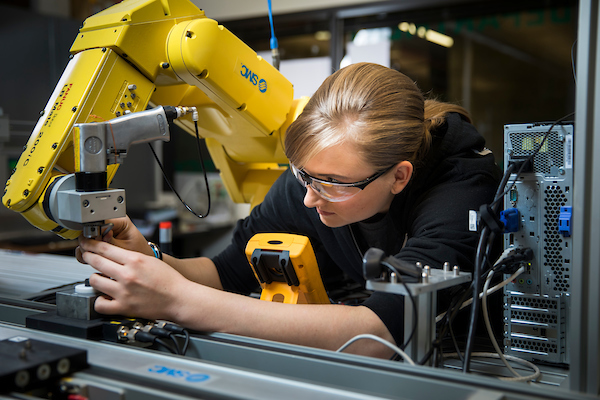 Person working on electrical machinery