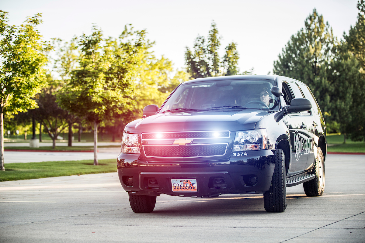 police vehicle with the siren lights on