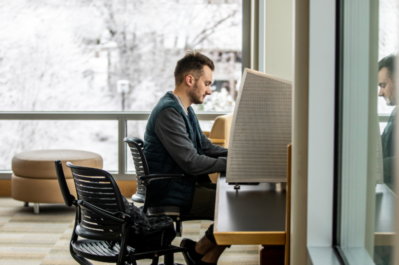 Employee working at computer.