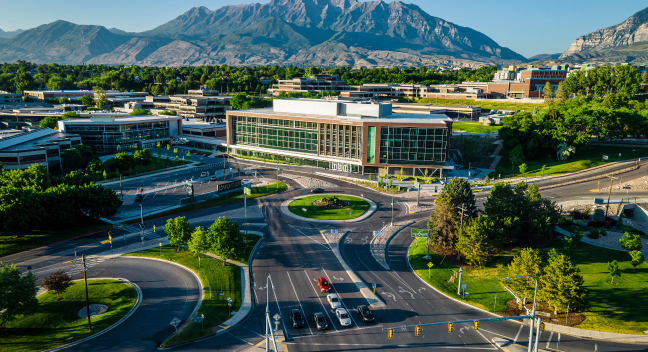 UVU seal sign in the front of campus