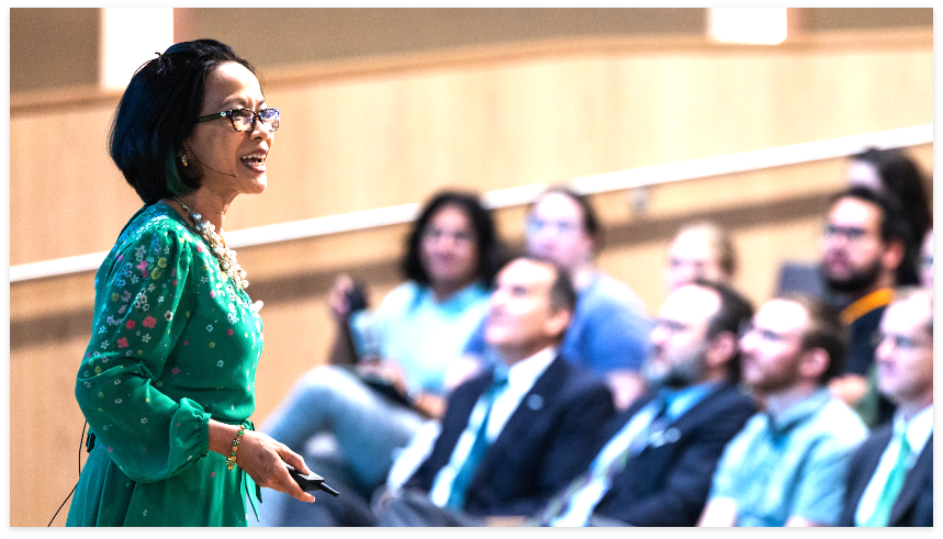 President Tuminez giving a speech in an auditorium