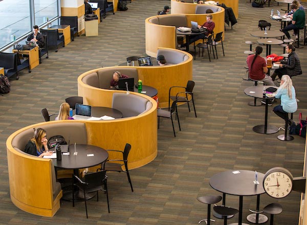 Students studying in the main UVU campus library.