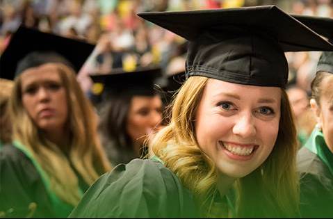 people in the cap and gowns