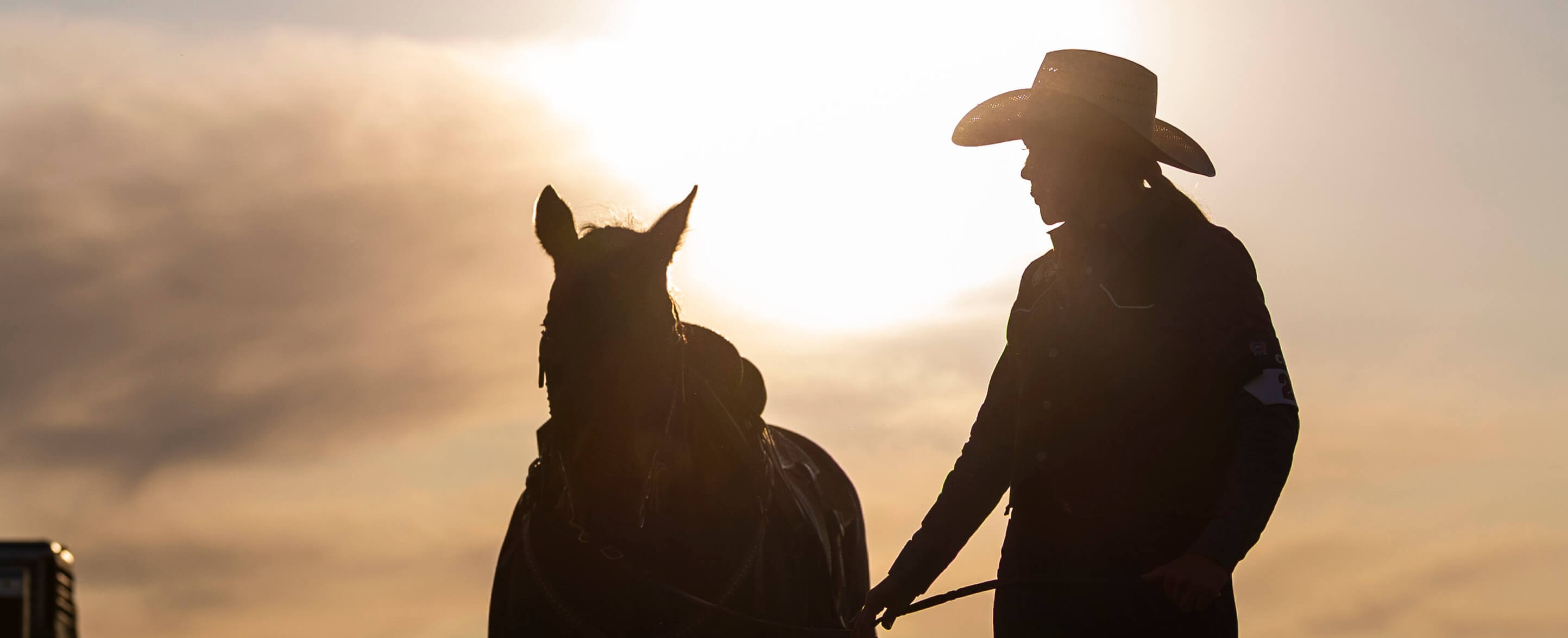 UVU's College Rodeo Team riding in the arena