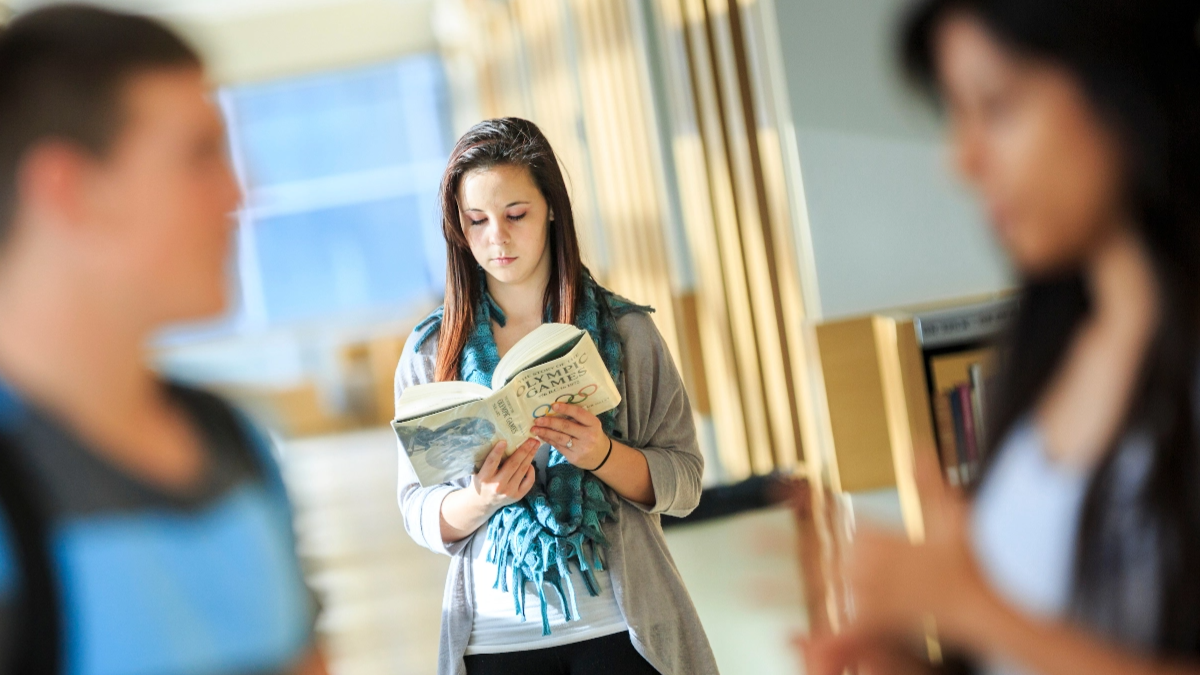 Woman reading a book.