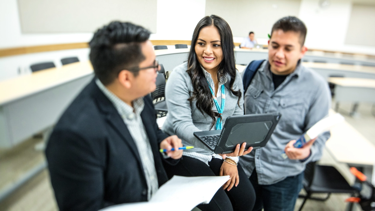 Three students in conversation.