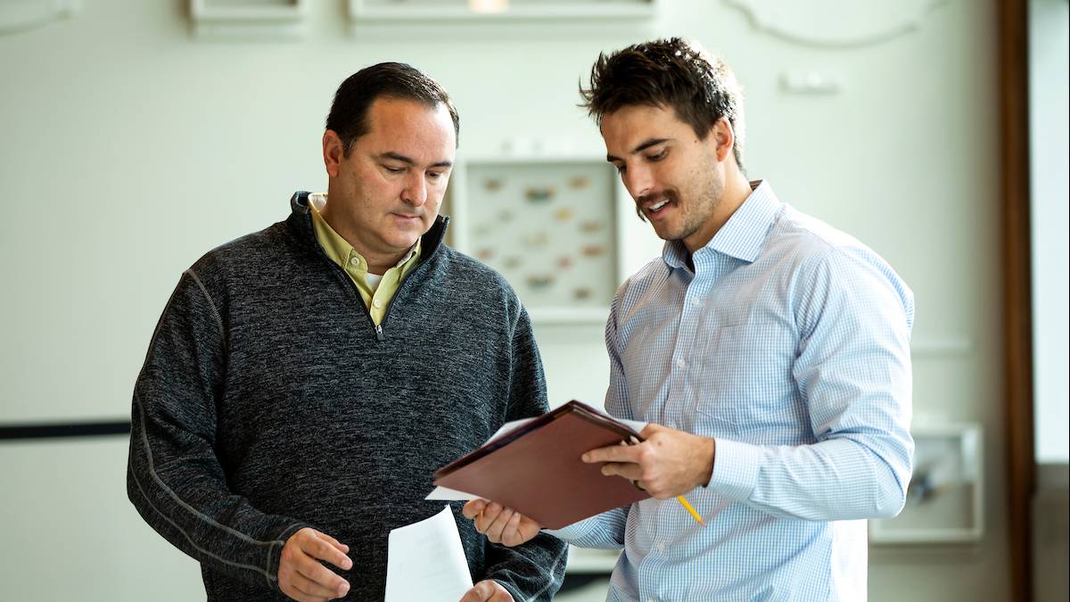 Faculty conducting a meeting 