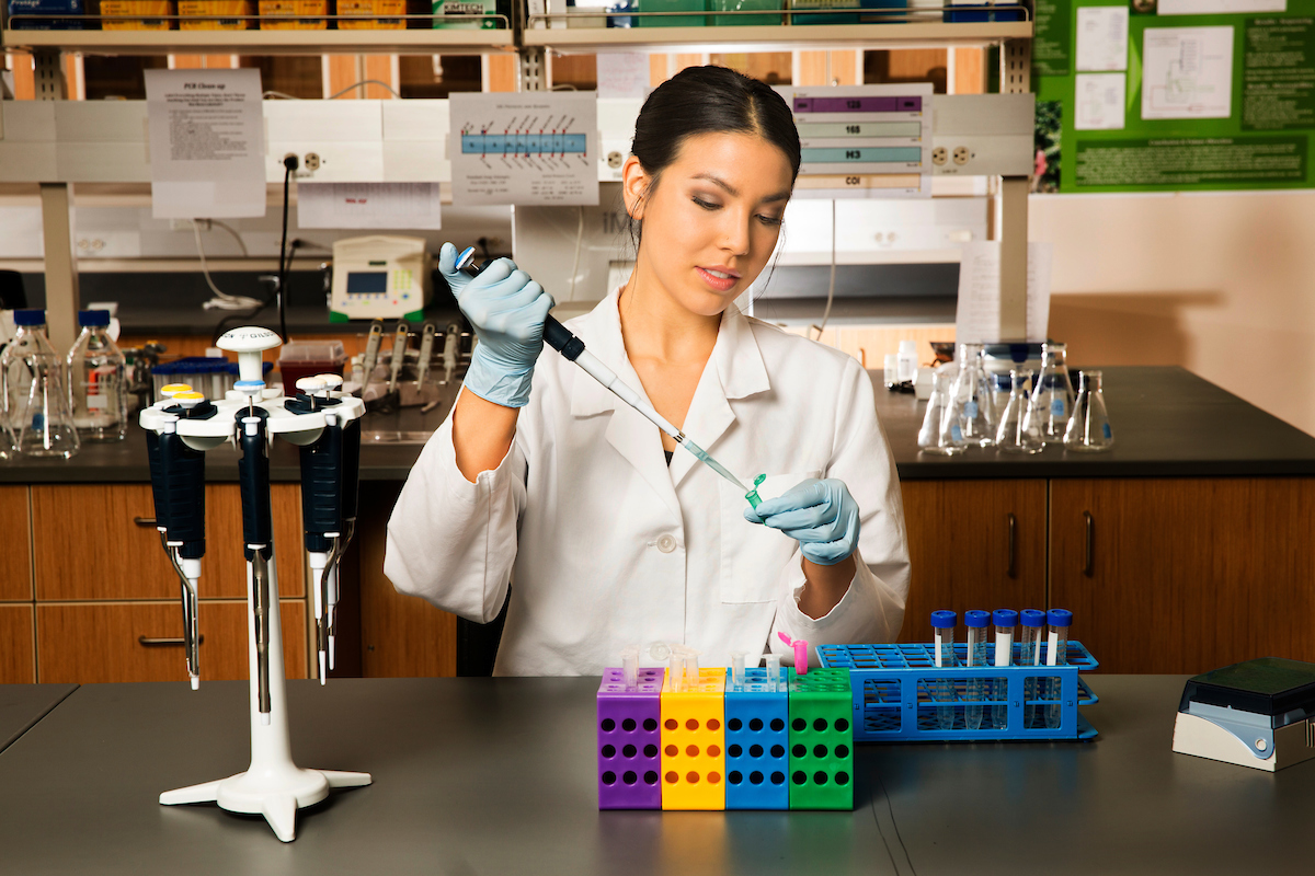 Student working on a project in a science lab