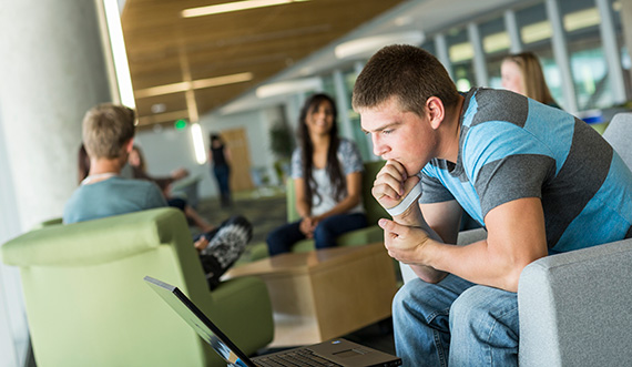 Student sitting and studying.