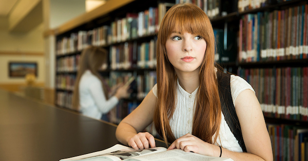 student in the library