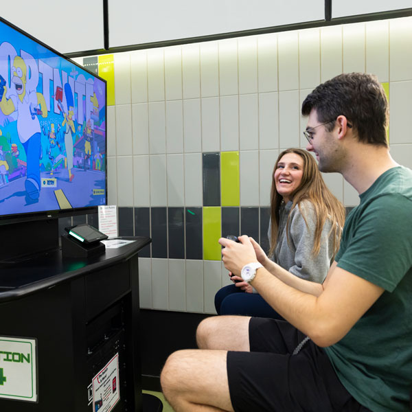 Students playing video games at the UVU gaming center
