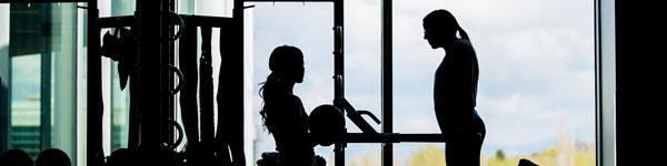 UVU student working with a fitness personal trainer