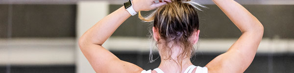 Student working out at the UVU SLWC fitness center