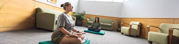 Students meditating as part of the UVU Wellness Programs