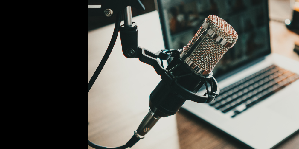 podcast microphone and laptop