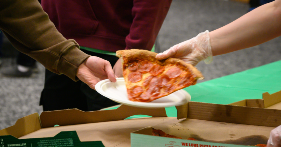 pizza at Wolverine Wednesday being plated for students