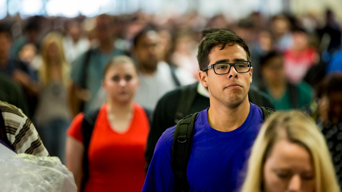 Students walking through the halls of UVU main campus.