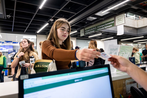 student getting ID at Campus Connection