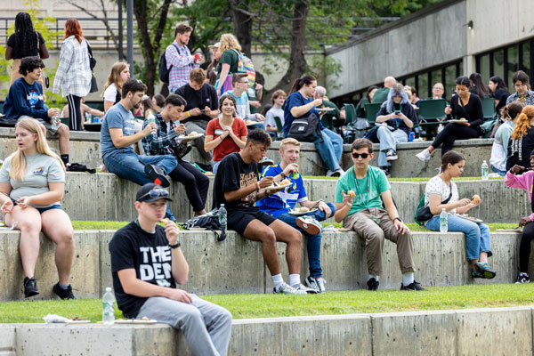 students hanging out on UVU campus.