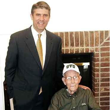Wilson Sorensen pictured here with then President of Utah Valley University, Matthew Holldand.