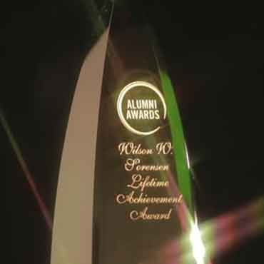 Wilson Sorensen Lifetime Achievement award, made of glass, pointed at the top.