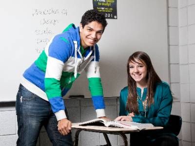 people looking at a book