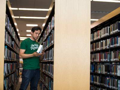 man in library