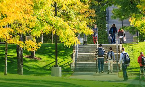 people walking on campus