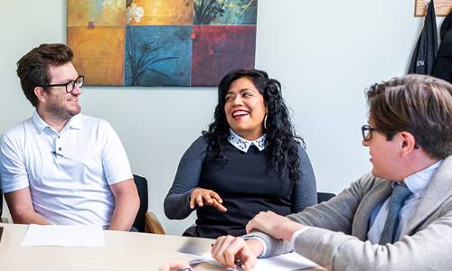 people talking at a table