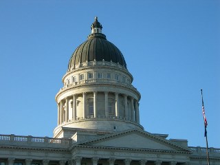 Exterior of Utah state capitol rotunda on sunny day