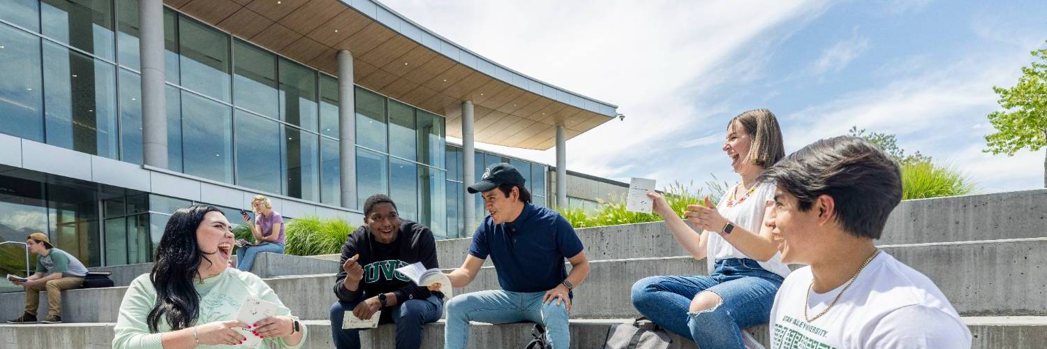 Students sitting in outside amphitheatre