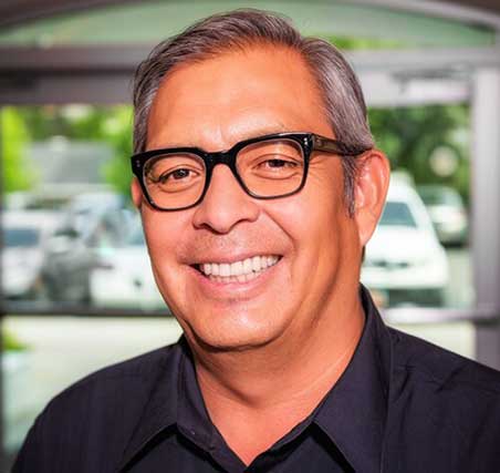 Photo of Ed Macha a male with grey hair and glasses