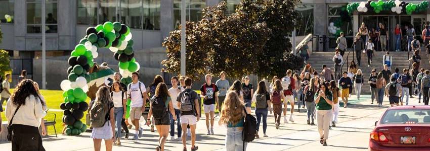 Students walking around on main UVU campus.