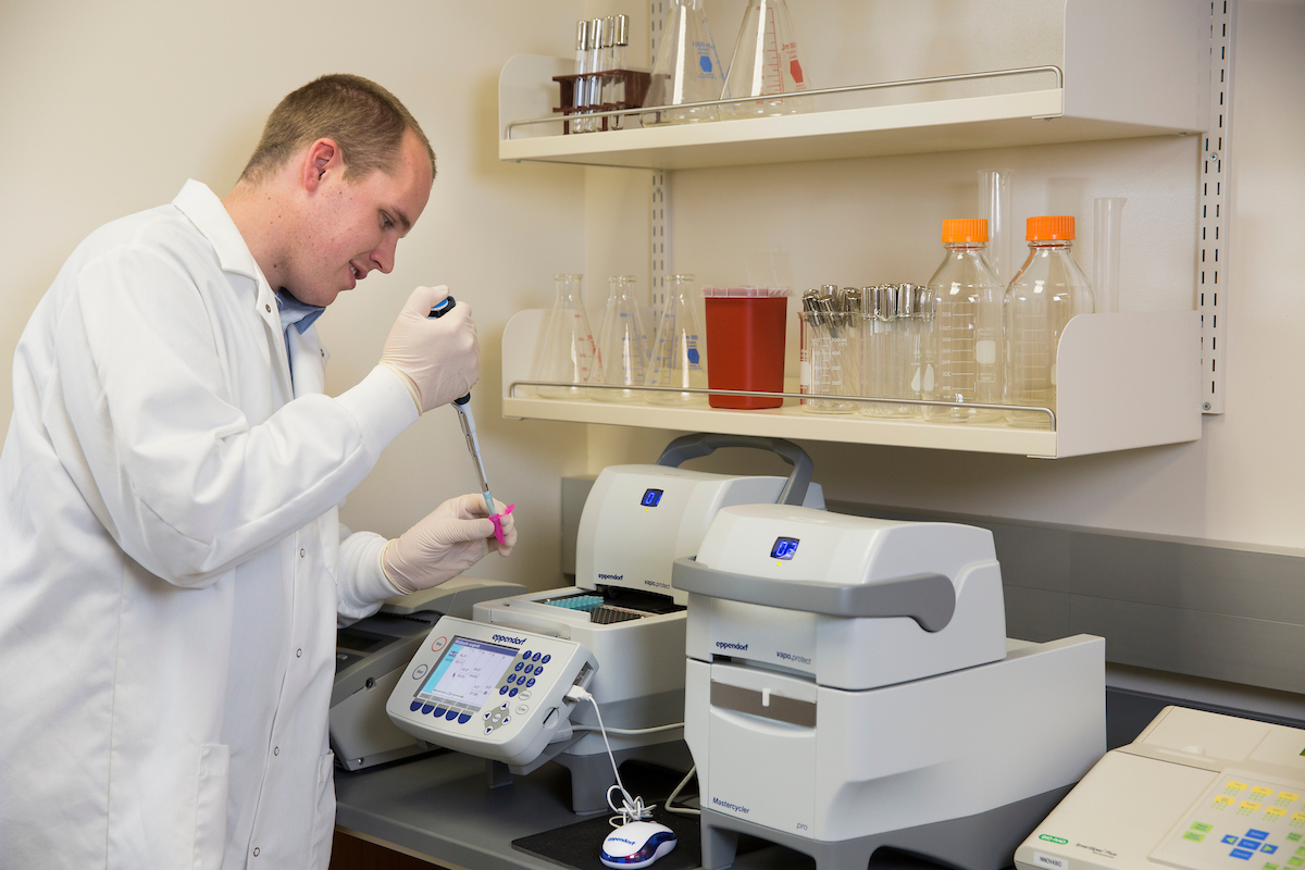 Image of a student in a science lab