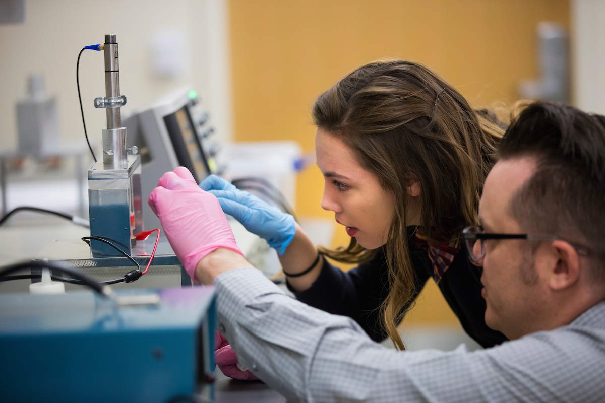 Image of a student in a science lab