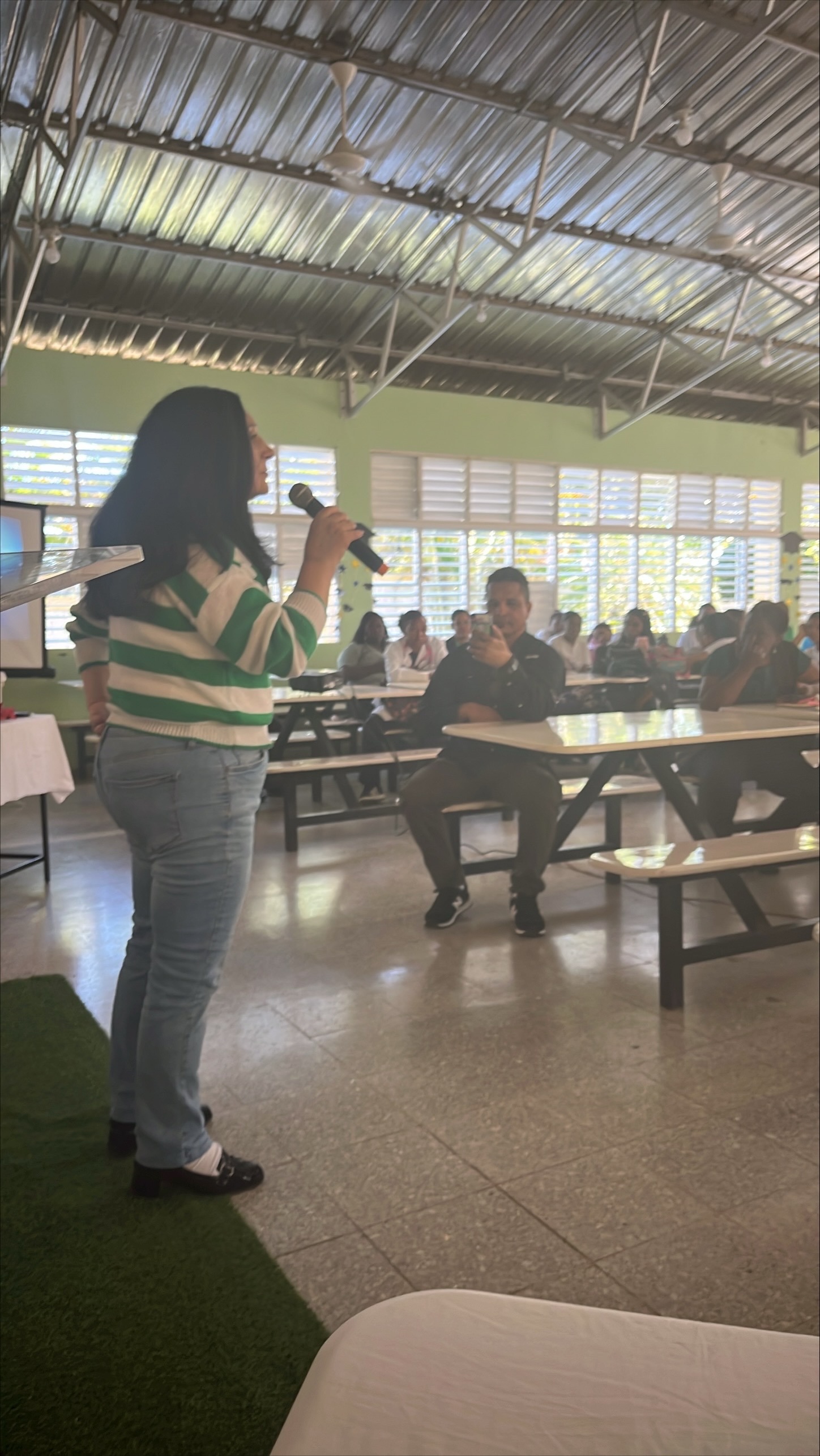 Speaker speaking in front of group
