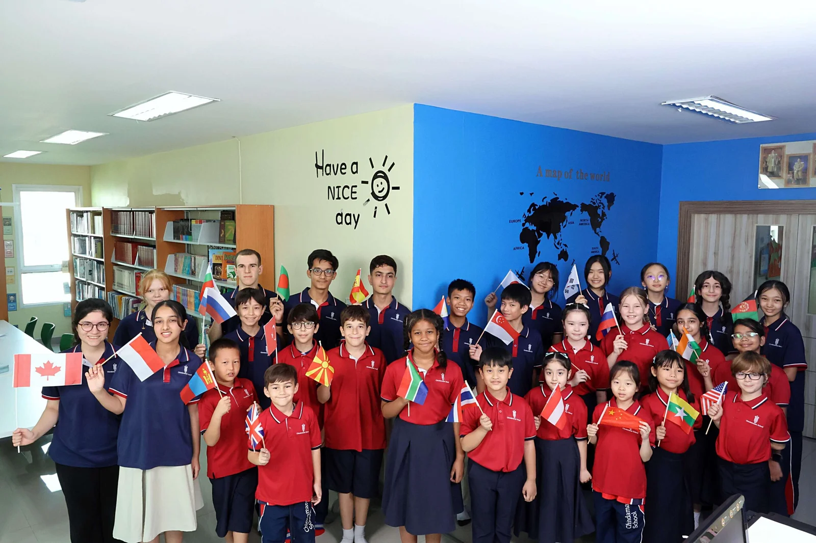 Students posing in a school library