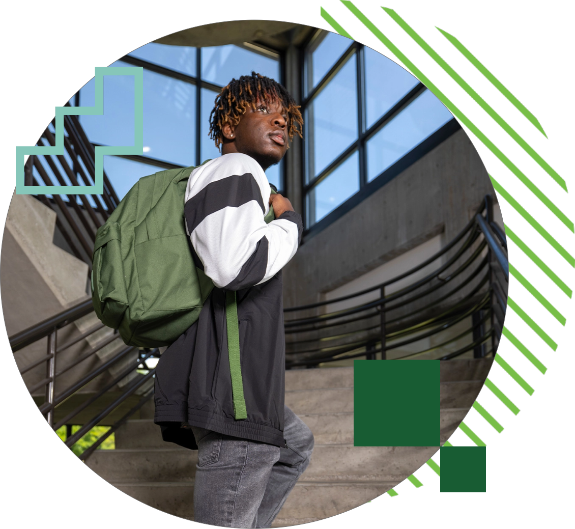 student walking up a staircase