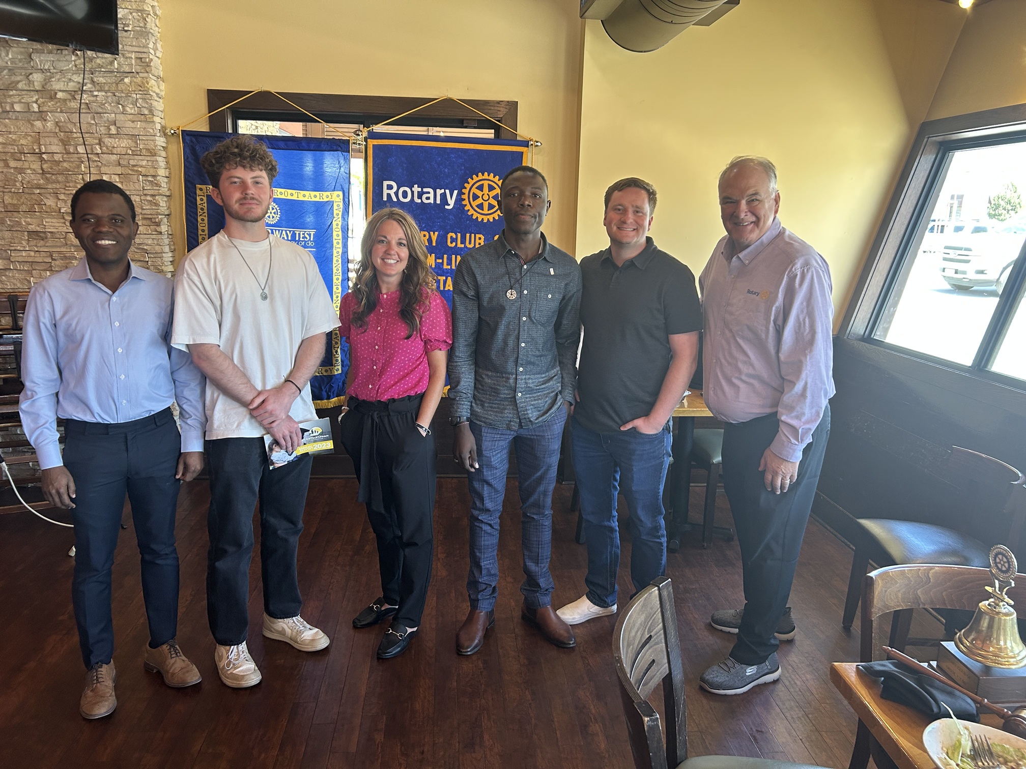 New Rotaractors Greet Speaker Katie Bunnell