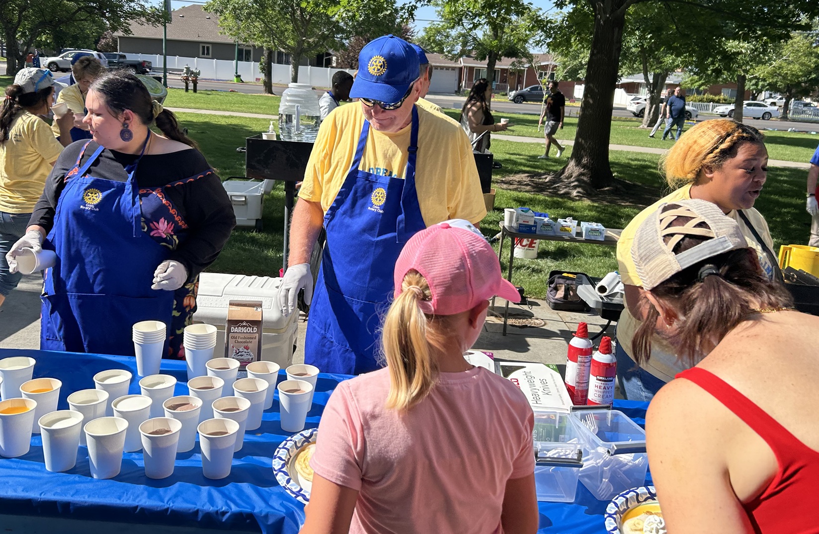 Rotaractors in Action By Serving Breakfast 