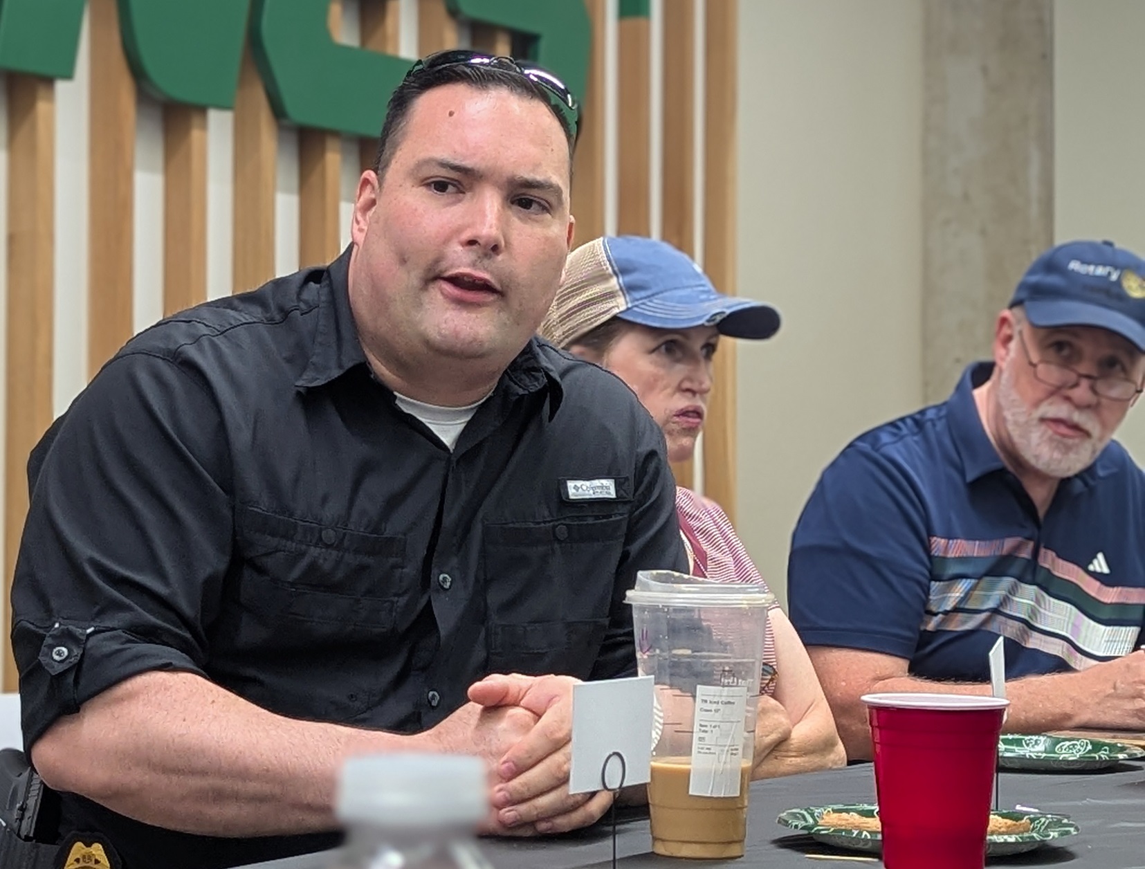 Tony Medina answers student questions during the UVU Lunch-In, joined by Cathy Ambrose, current President of the Orem/Lindon Rotary Club, and Mike Rich, past Club President.