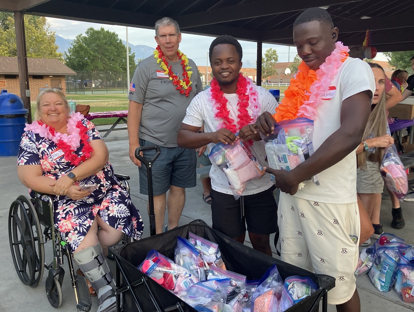 Rotarians and Rotaractors enjoy Luau